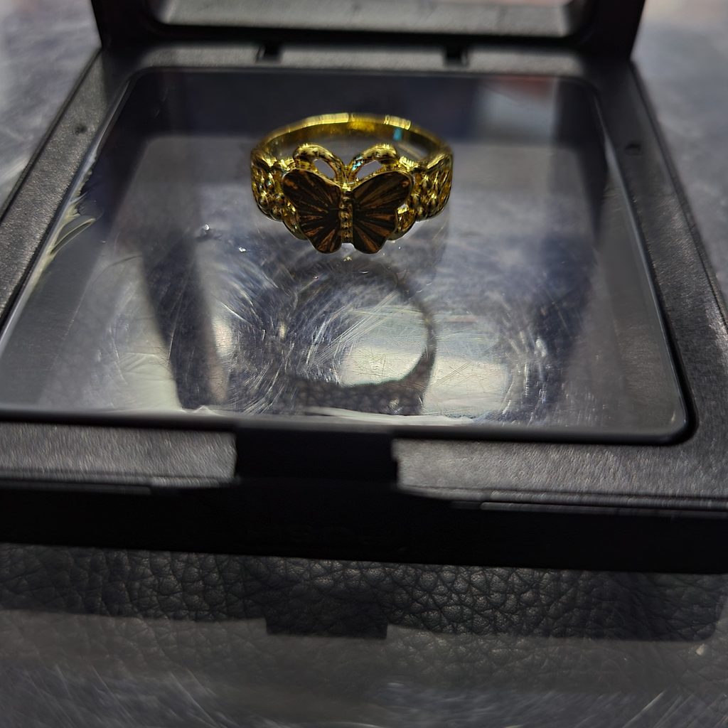 Gold-colored ring promotion on Grab Mart